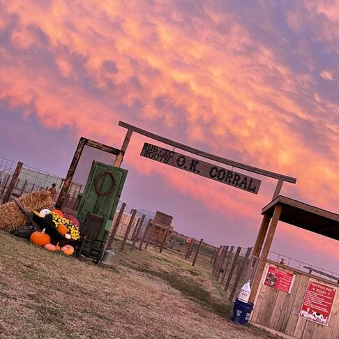 Rustic Roots event venue entrance at sunset